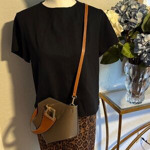 New Cross body handbag without tags. Olive green, brown with gold accents.